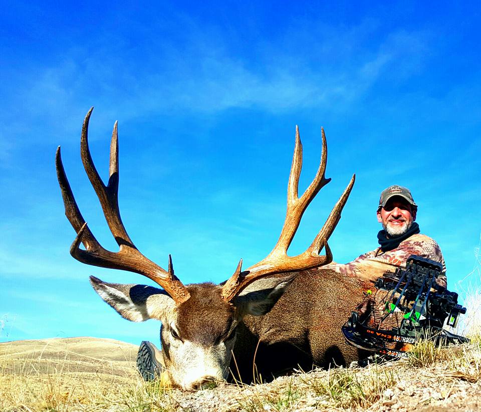 Matt with his 180" Mule Deer taken in Nevada with the bow