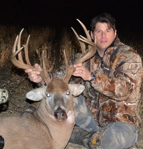 Brian with a slammer whitetail in Kansas
