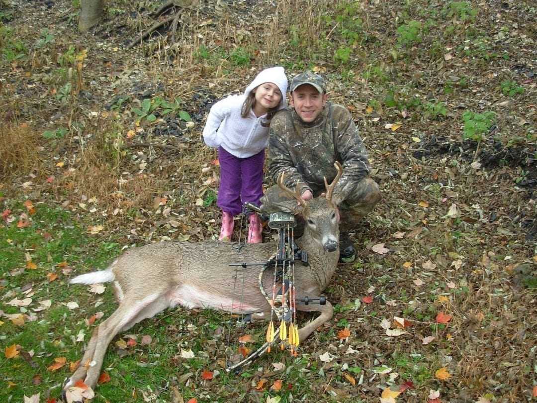 Stef with a whitetail buck